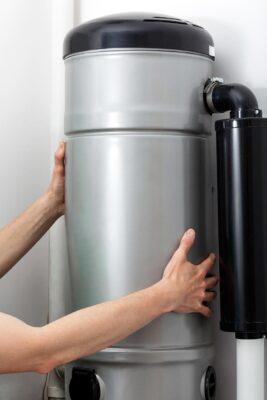 Central vacuum cleaner installation, handyman at work